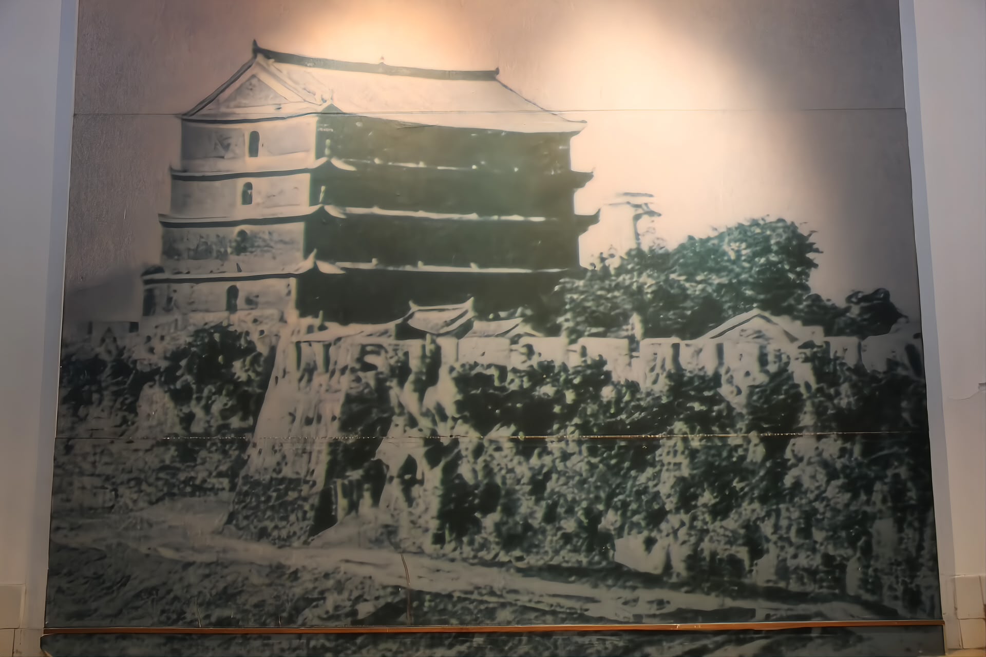 An old photograph or print of Zhenhai Tower on Yuexiu Hill